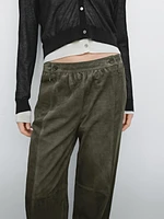 Suede leather trousers with linen detail