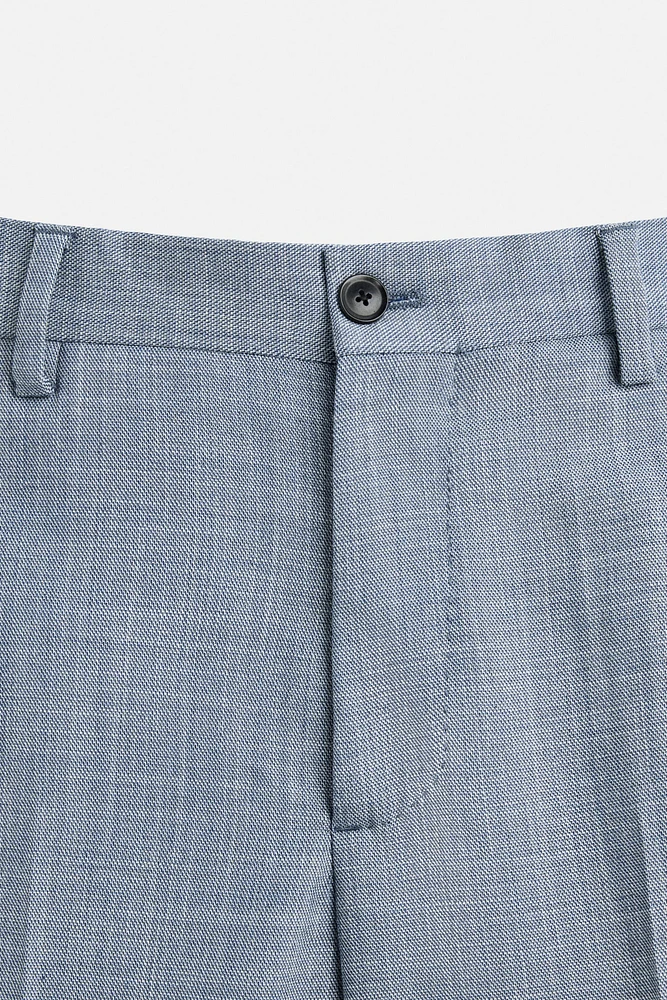 TEXTURED SUIT PANTS