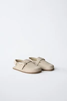 SABOTS EN CUIR