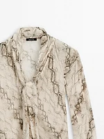 Flowing animal print scarf shirt