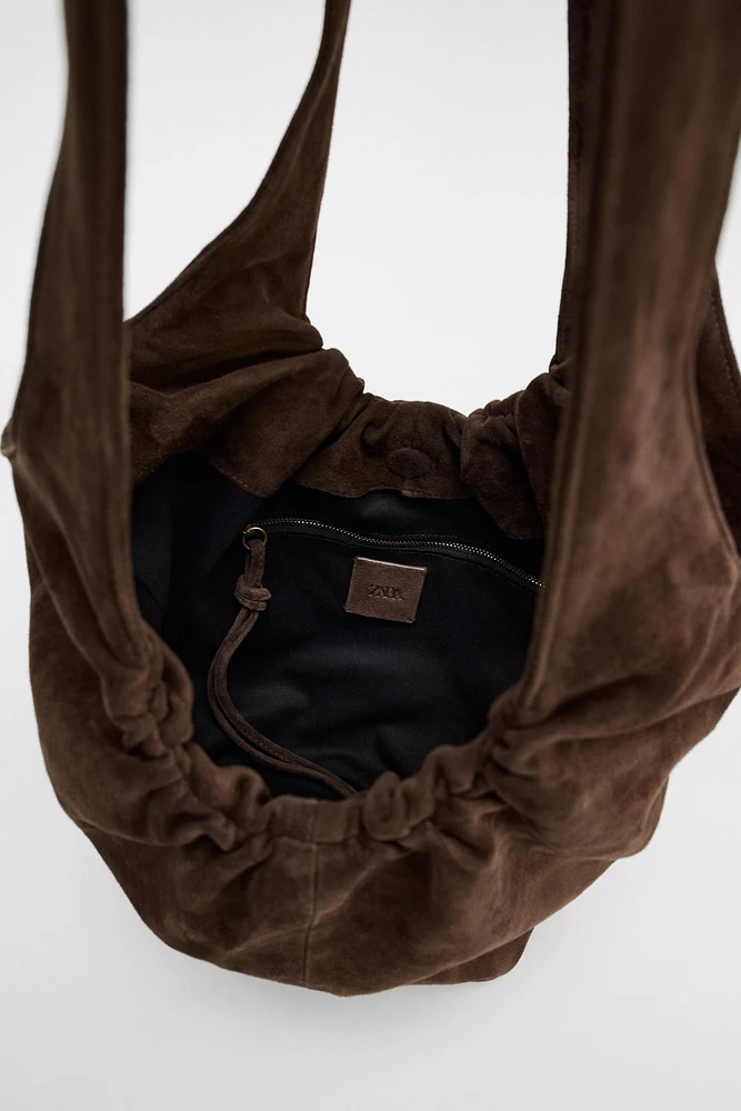 RUCHED SPLIT LEATHER BUCKET BAG