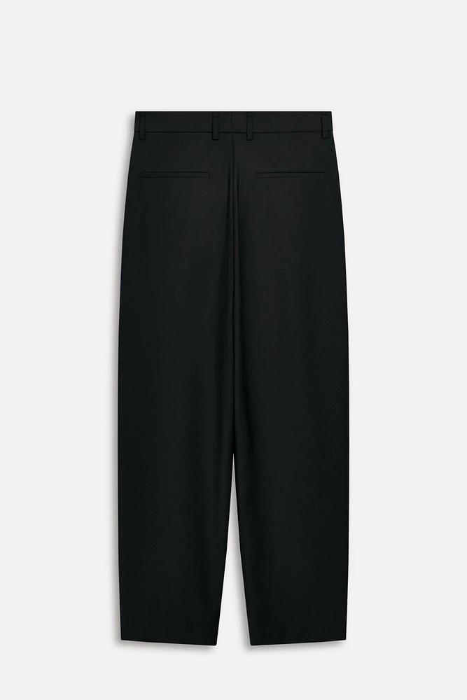 PANTALON À PINCES CONTENANT DE LA LAINE 50E ANNIVERSAIRE
