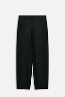 PANTALON À PINCES CONTENANT DE LA LAINE 50E ANNIVERSAIRE
