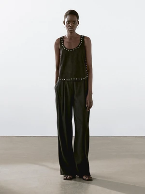 Suede leather top with stud details