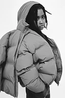 MANTEAU DÉPERLANT ÉTIQUETTE