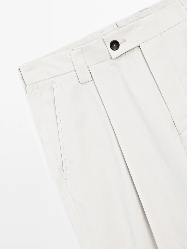 Pantalon à pince en crêpe de coton mélangé - Limited Edition