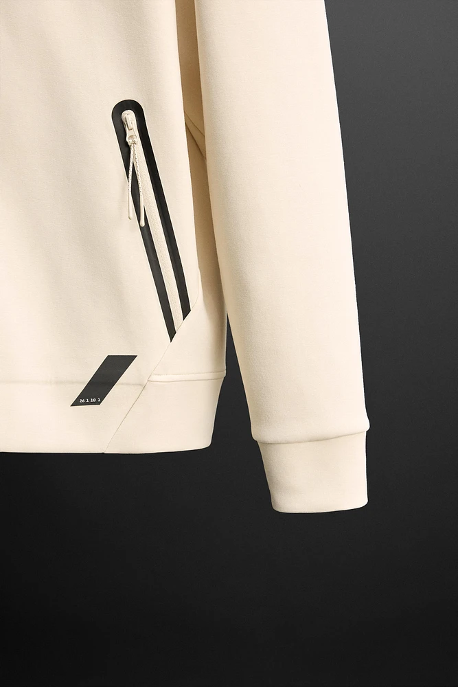 TECHNICAL ZIP SWEATSHIRT