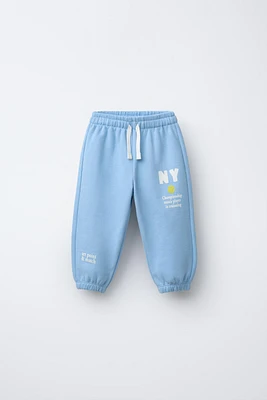 PLUSH TEXT JOGGER PANTS