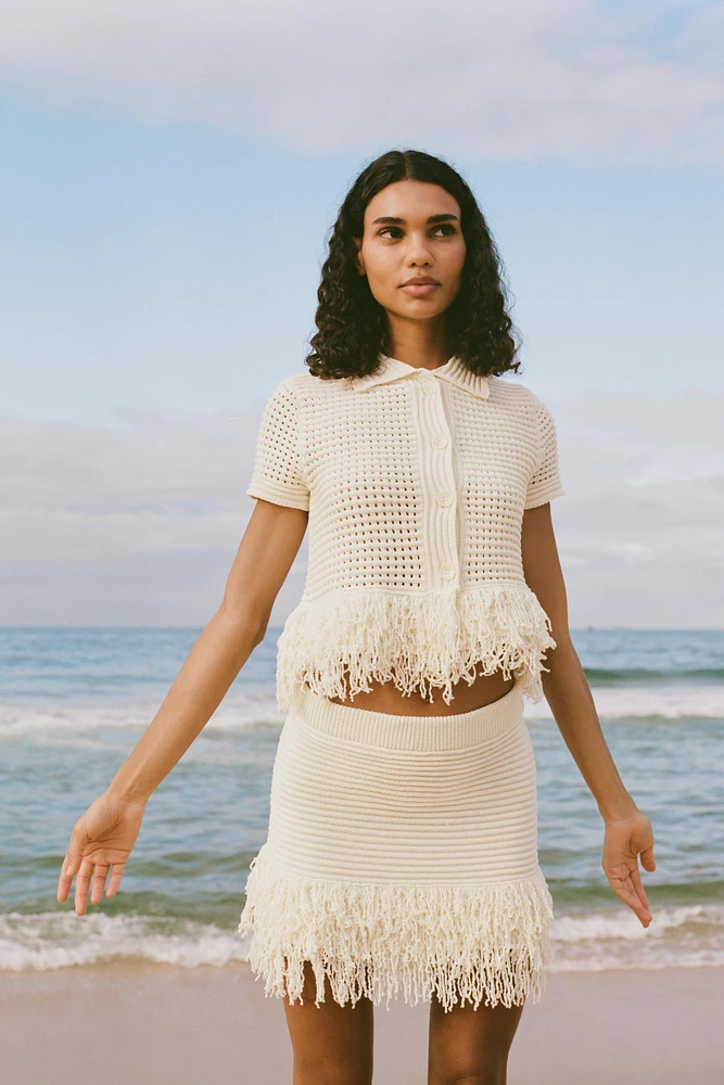 GILET EN MAILLE QUADRILLÉ À FRANGES