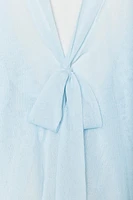 BLOUSE SEMI-TRANSPARENTE EN MAILLE