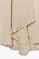 JUPE FLUIDE SEMI-TRANSPARENTE