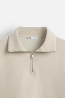 QUARTER ZIP TECHNICAL SWEATSHIRT