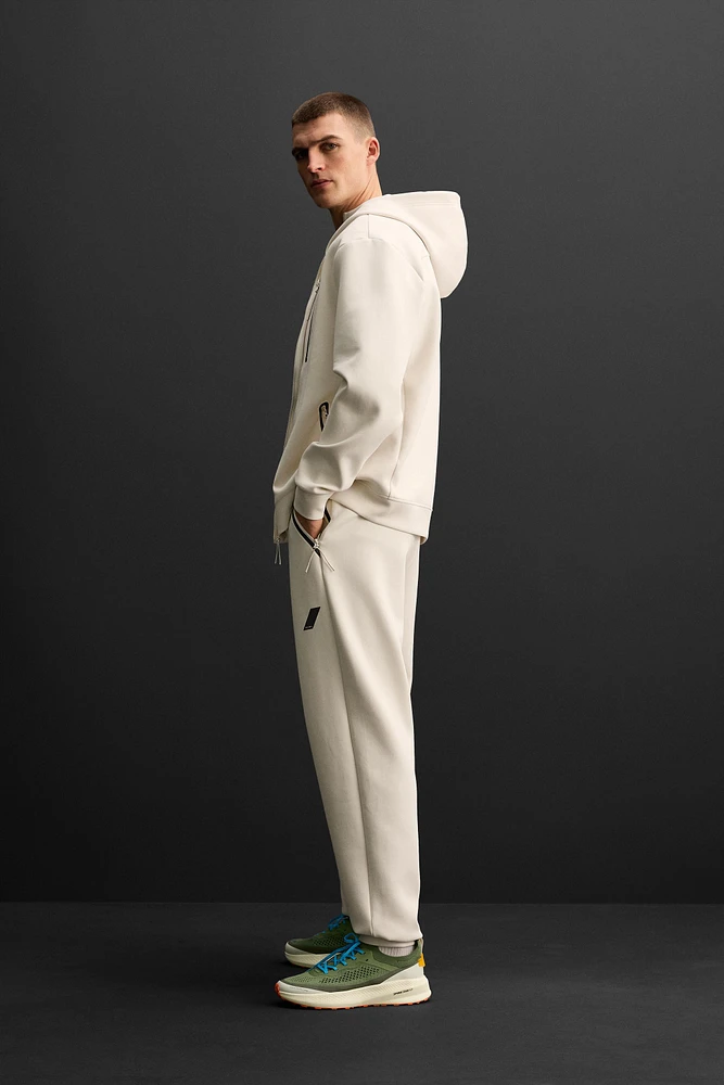 TECHNICAL ZIP SWEATSHIRT