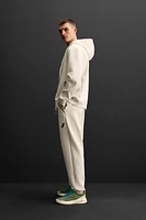 TECHNICAL ZIP SWEATSHIRT