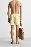 MAILLOT DE BAIN MI-LONG À IMPRIMÉ GÉOMÉTRIQUE