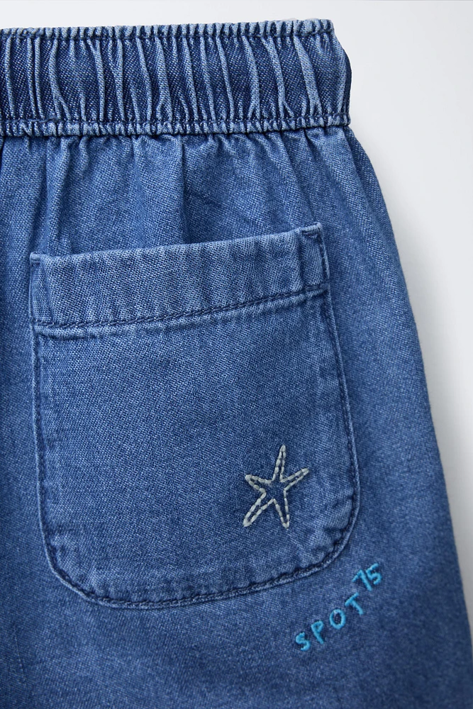 BERMUDA EN DENIM PALMIER BRODÉ