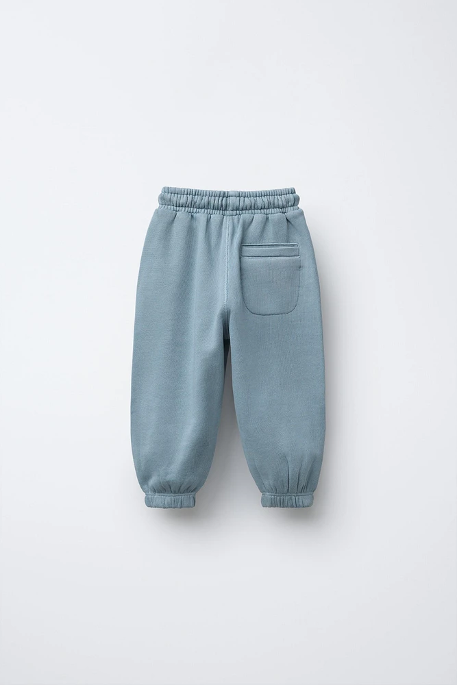 PANTALON DE JOGGING À ÉTIQUETTE