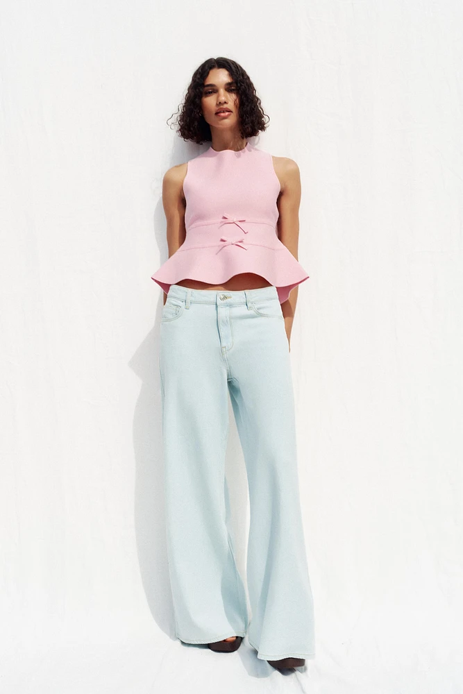 TIE-DETAIL PEPLUM KNIT TOP