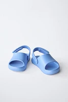 RUBBER SLINGBACK SANDALS