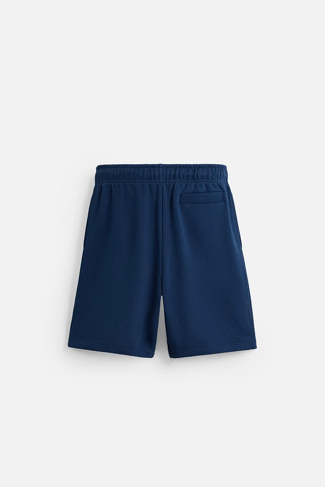 BERMUDA DE JOGGING COUTURES