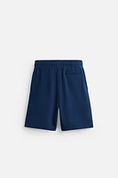 BERMUDA DE JOGGING COUTURES