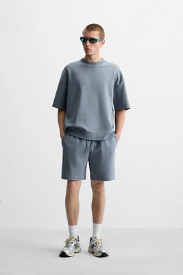 INTERLOCK STRUCTURED SHORTS