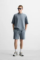 INTERLOCK STRUCTURED SHORTS