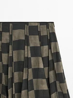 Flowing check midi skirt