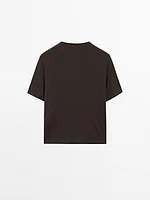 Oversized T-shirt with eyelets