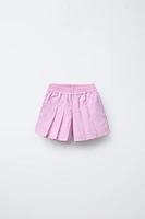 TECHNICAL PLEATED SKORT