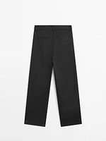 Flowing wide-leg cotton blend trousers with pleats