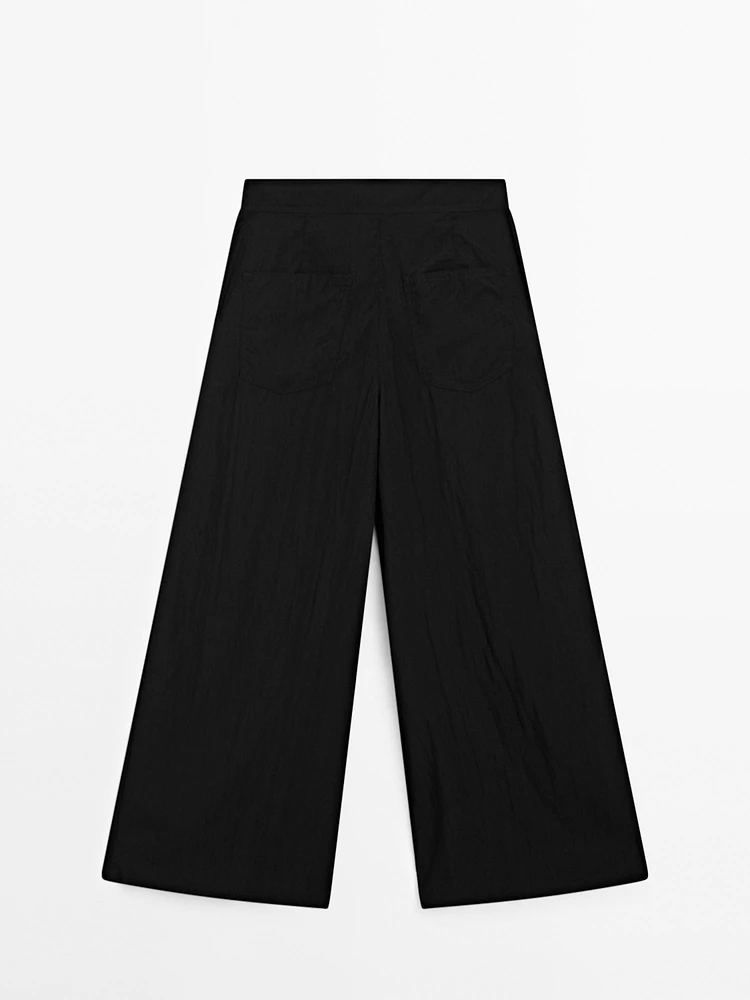 Pantalon palazzo fluide à pinces