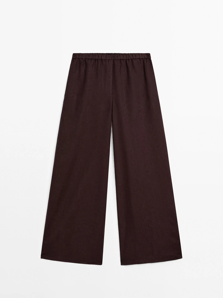 Straight-fit linen trousers with an elasticated waistband
