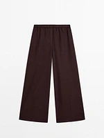 Straight-fit linen trousers with an elasticated waistband