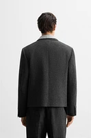 BOUTONNÉ TEXTURED SUIT JACKET