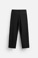 RELAXED FIT PLEATED PANTS