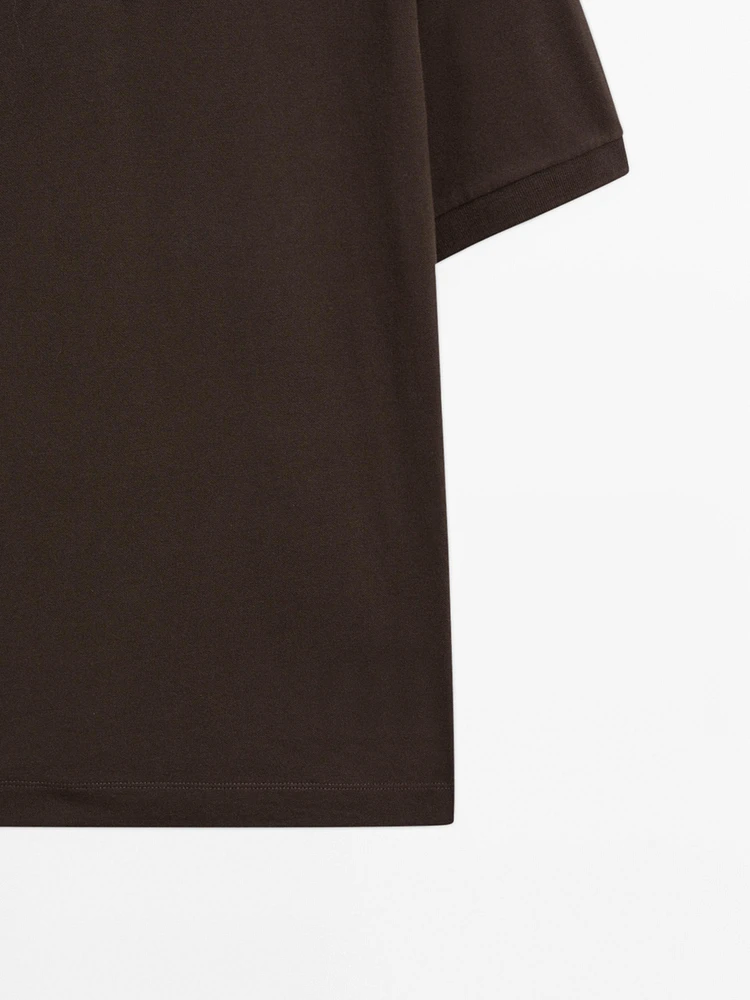 Cotton blend slim fit knit polo shirt