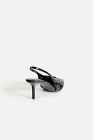 LEATHER SLINGBACK SHOE WITH EYELETS 50TH ANNIVERSARY