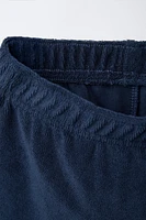 ENSEMBLE JOGGING POLO ET BERMUDA ÉPONGE ÉTIQUETTE