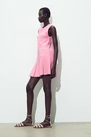 ROBE EN MAILLE À PLIS