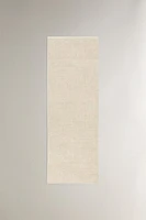 RECTANGULAR DOUBLE BOUCLÉ JUTE AREA RUG