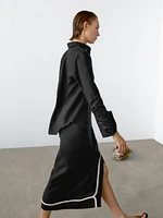 Jupe midi avec broderie contrastante