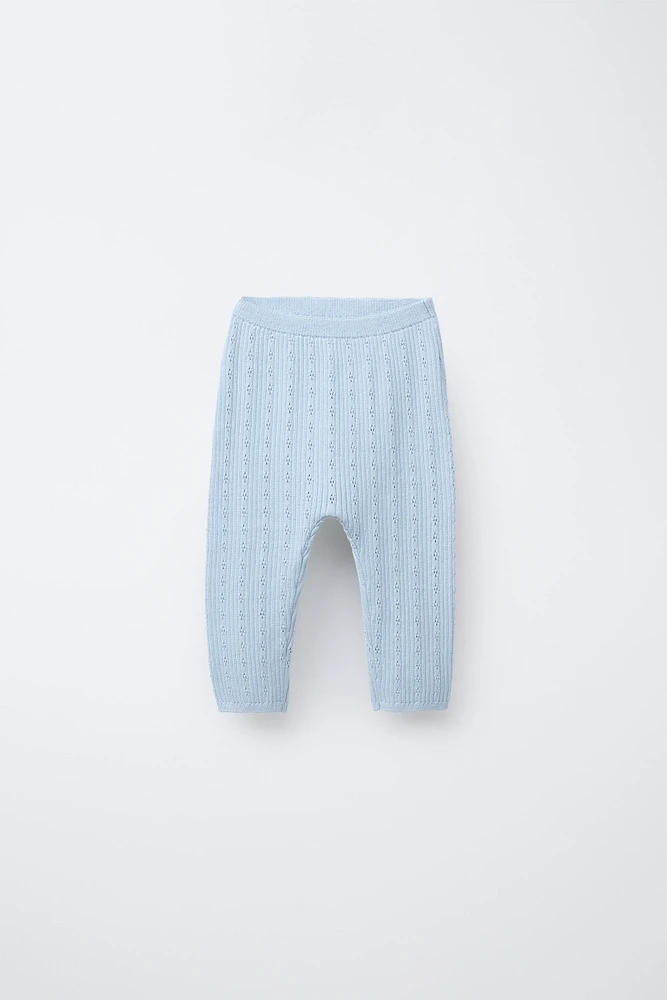 PANTALON EN MAILLE AJOURÉ