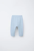 PANTALON EN MAILLE AJOURÉ