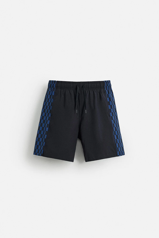 LONG CHECKERED BANDS SWIMSUIT