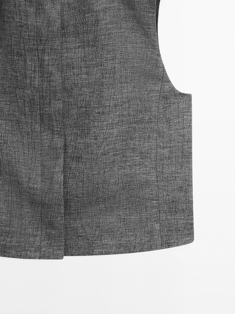 Veste courte sans manches lin