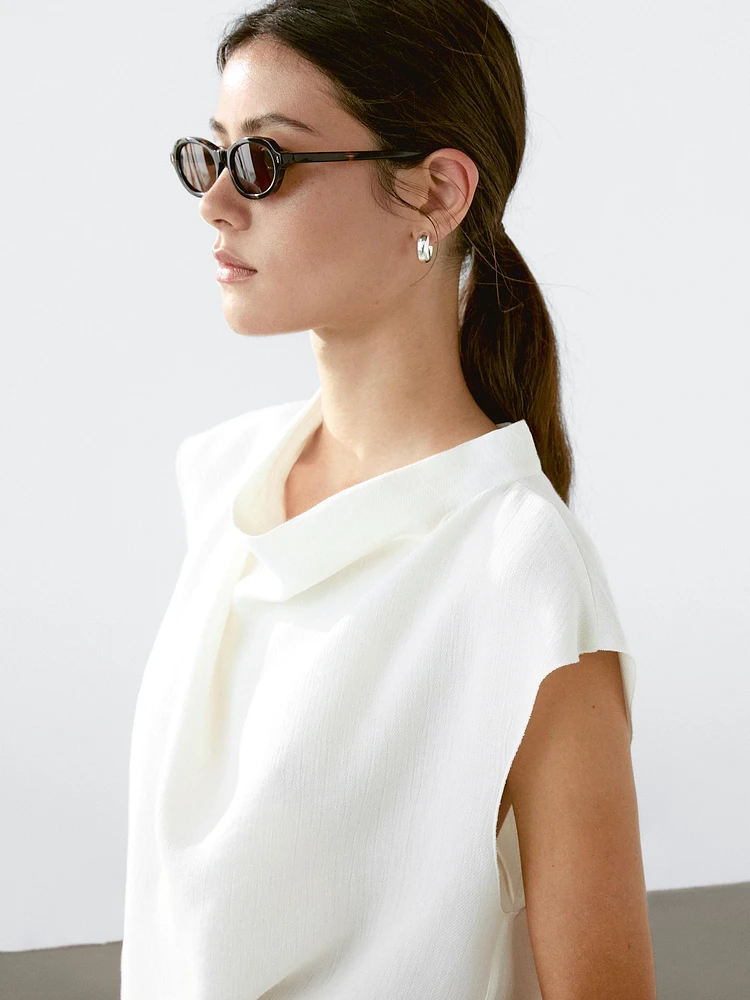 Blouse fluide à col drapé