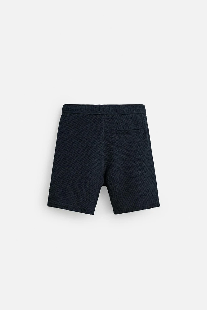 TEXTURED REGULAR FIT BERMUDA SHORTS