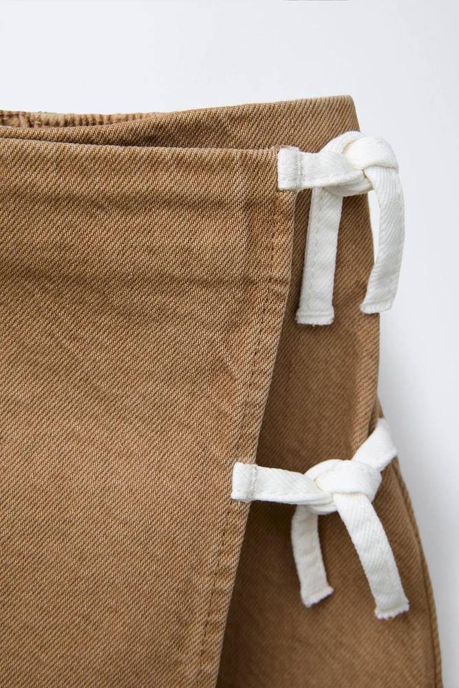 SERGED SKIRT WITH TIES