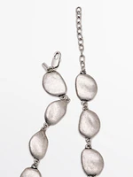 Cascade-effect necklace